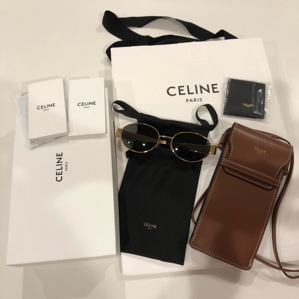 Authentic Celine Triomphe Gold Metal Oval Sunglasses with Green lenses.